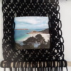 Porte photo en macramé couleur noir à suspendre.